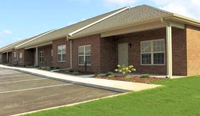 Tuscumbia apartment for rent - Apartment building with private front porch at Breckenridge Apartments in Tuscumbia, AL