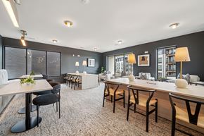 Birmingham apartment for rent - A modern dining area with a long table and chairs.