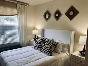 Mt. Dora apartment for rent - a bedroom with a large white bed and pillows