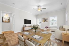 Huntsville apartment for rent - Living room and dining area at Cottages at Oak Grove Dairy in Huntsville, AL