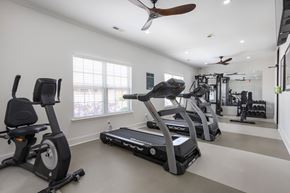 Florence apartment for rent - A spacious home gym with a variety of exercise equipment.