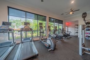 Birmingham apartment for rent - the gym has plenty of cardio equipment and large windows