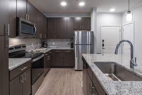 Santa Rosa apartment for rent - Spacious kitchen with large island and granite countertops Costal Model floorplan