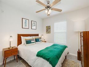 Antioch apartment for rent - a bedroom with a bed and a ceiling fan