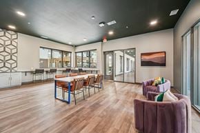 Birmingham apartment for rent - A modern dining room with a long table and chairs.