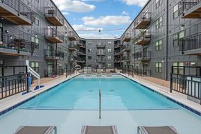 Indianapolis apartment for rent - A large indoor swimming pool in a residential building.