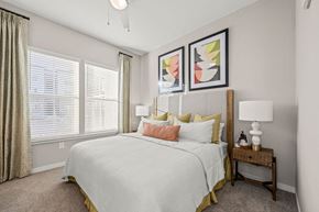 Indian Land apartment for rent - a bedroom with a large bed and windows