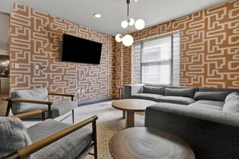 Resident lounge with wifi, complimentary coffee bar, and pool table