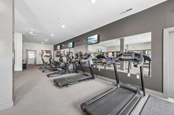 24-Hour fitness center with free weights