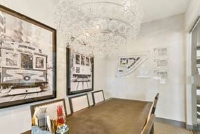 Columbus apartment for rent - a dining room with a table and a chandelier