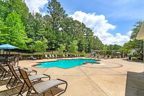 Clinton apartment for rent - a swimming pool with chaise lounge chairs and umbrellas