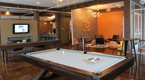 Portage apartment for rent - Clubhouse gameroom with pool table, full kitchen, and social lounge. at Promenade at Founders Square Apartments in Indianapolis, IN