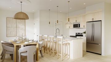 Calgary townhouse for rent - A modern kitchen with a dining table and chairs.