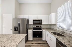 Phoenix apartment for rent - Granite countertops in Kitchen at LINQ at South Mountain, Phoenix, AZ