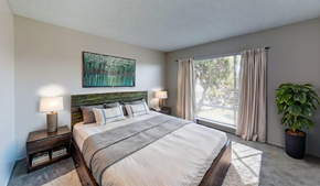 El Cajon apartment for rent - a bedroom with a large bed and a window