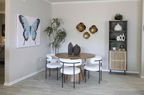 Peoria apartment for rent - A dining room with a round table and chairs.