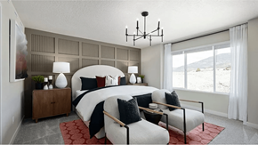 Heber City townhouse for rent - A bedroom with a large bed and a view of the outdoors through a window.