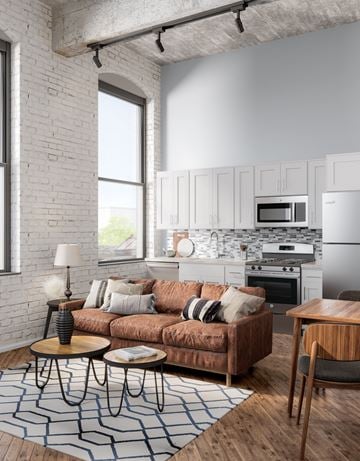 Philadelphia apartment for rent - A modern living room with a brown sofa and a coffee table.