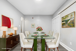 Philadelphia apartment for rent - A dining room with a glass table and white chairs.