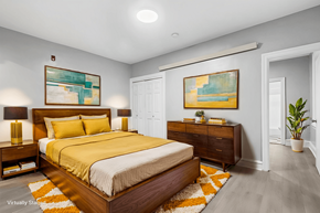 Philadelphia apartment for rent - A bedroom with a large bed and two nightstands.
