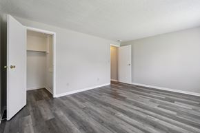 Columbus apartment for rent - A room with a white door and a grey floor.