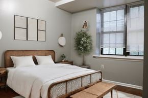 Philadelphia apartment for rent - a bedroom with a large bed and a window
