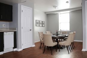 Philadelphia apartment for rent - a dining room and kitchen with a table and chairs