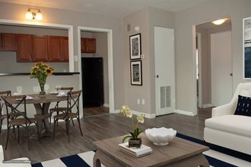 Indianapolis apartment for rent - A modern kitchen with a dining table set for two.