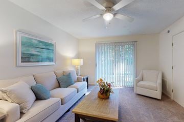 Greenville apartment for rent - a living room with a couch and a coffee table