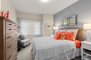Gig Harbor apartment for rent - a bedroom with a bed and a dresser