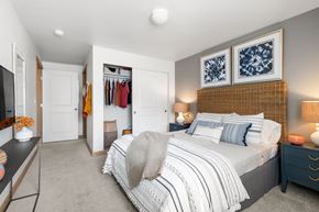 Bremerton apartment for rent - a bedroom with a bed and a closet