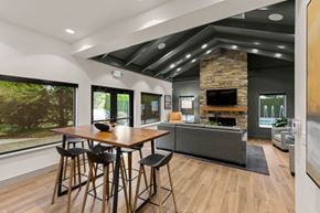 Fife apartment for rent - A modern dining room with a wooden table and chairs.