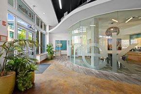 Auburn apartment for rent - the lobby of a building with a large peace sign in the middle