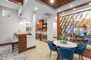 Maple Valley apartment for rent - a dining room and kitchen with a table and chairs