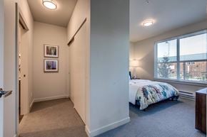 Maple Valley apartment for rent - a bedroom with a bed and a large window