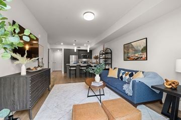 Federal Way apartment for rent - a living room with a blue couch and a table