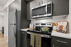 Federal Way apartment for rent - a kitchen with stainless steel appliances and a microwave