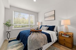 Federal Way apartment for rent - a bedroom with a bed and two windows