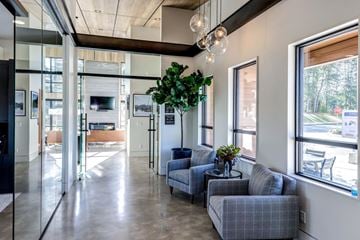 Maple Valley apartment for rent - a living room with couches and a table in a lobby