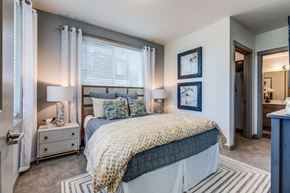Kent apartment for rent - a bedroom with a large window and a bed