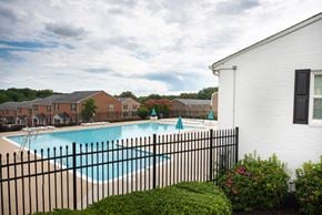 North Chesterfield apartment for rent - A black fence surrounds a small pool.