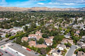 Concord apartment for rent - arial view of a neighborhood with trees and mountains in the background at Greentree Terrace Apartments, CONCORD, CA