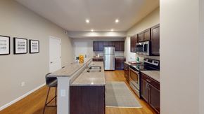 Kent apartment for rent - a kitchen with granite countertops and stainless steel appliances