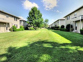 Gulfport apartment for rent - Grass courtyard between buildings at Waters Mark Apartment Homes, Gulfport, Mississippi