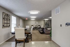 Shinnston apartment for rent - A dining room with a table and chairs.