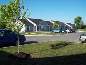 West Union apartment for rent - a street with cars parked in front of houses