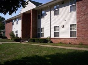 Parkersburg apartment for rent - a white house with a sidewalk in front of it
