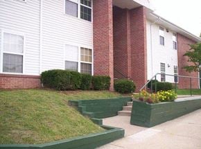 Parkersburg apartment for rent - a brick building with steps in front of it