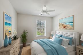 Queenstown apartment for rent - a bedroom with a bed and a ceiling fan