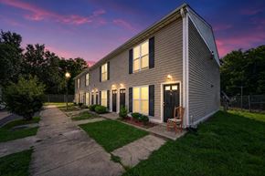 Emporia apartment for rent - A house with a chair in front of it.